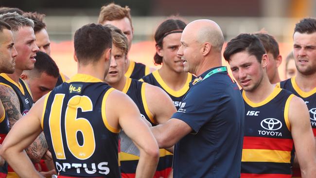 GOLD COAST, AUSTRALIA - JULY 05: Crows coach Matthew Nicks talks to players during the round 5 AFL match between the Adelaide Crows and the Fremantle Dockers at Metricon Stadium on July 05, 2020 in Gold Coast, Australia. (Photo by Chris Hyde/Getty Images)