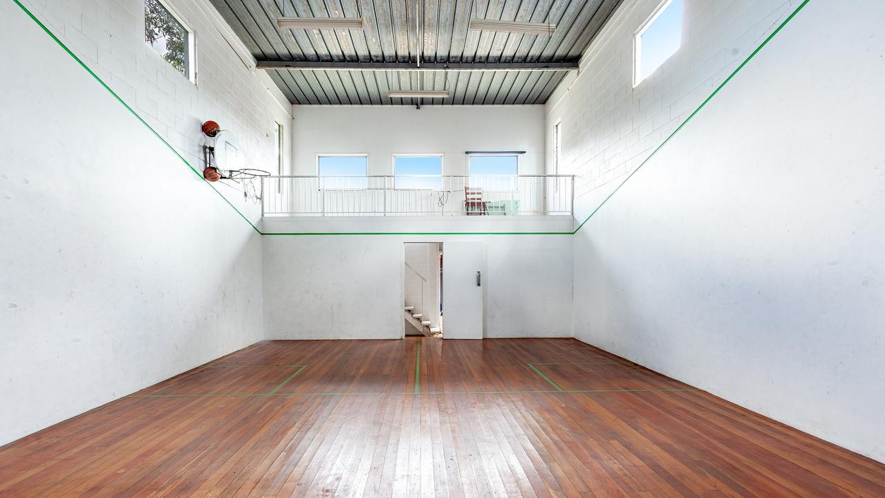 A quirky Toowoomba home on Olsen Street in Rangeville, featuring just one bedroom, two bathrooms as well as a pool and squash court, has hit the market through Elders Real Estate.