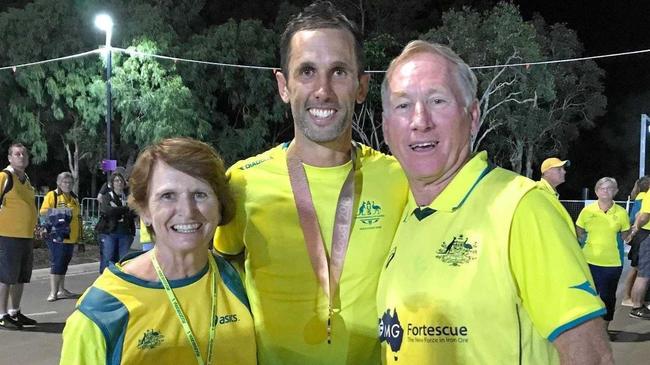 Barb Knowles and husband Ryan celebrate with son Mark after he ended his international career with a gold medal at the Gold Coast Commonwealth Games last year. Picture: CONTRIBUTED