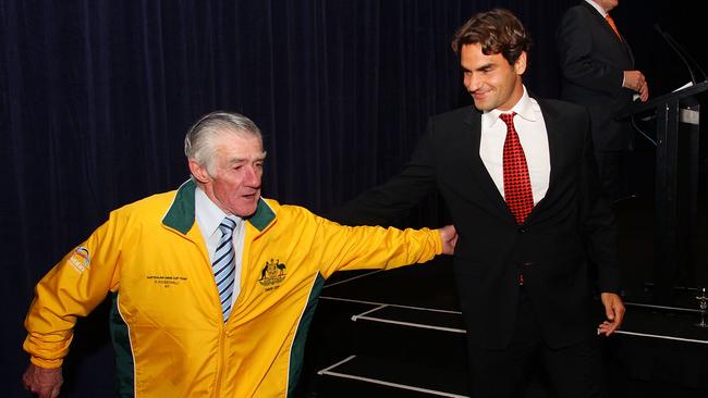 Roger Federer and former Australian tennis player Ken Rosewall in 2011. (Photo by Matt King/Getty Images)