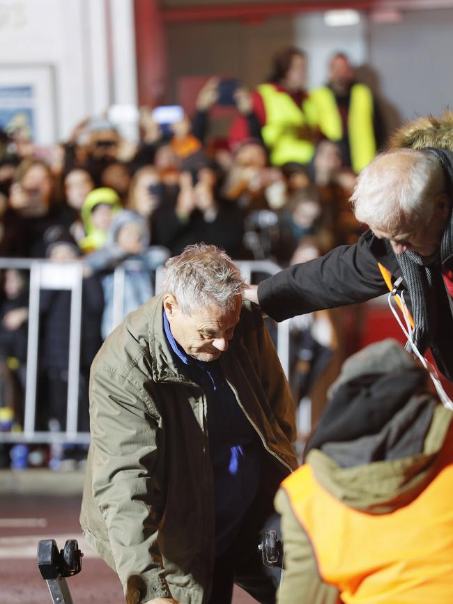 Mike Parr's emergence from beneath Macquarie Street, Hobart, where he stayed for 72 hours as part of the Dark Mofo festival last year. Picture: MATHEW FARRELL