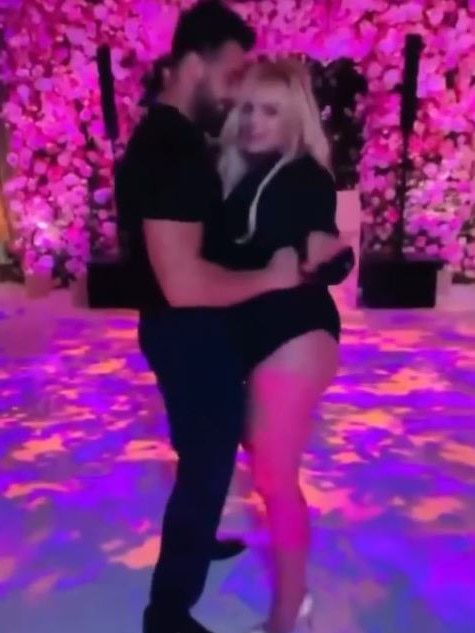 Britney and Sam dance at their wedding.