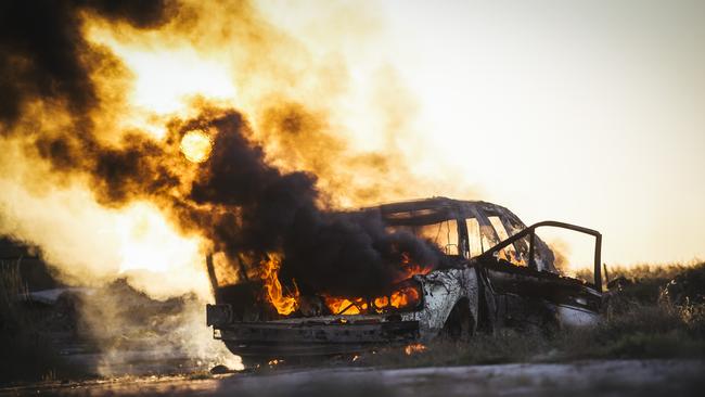 FILE PHOTO: A car stolen from Mount Lofty was found torched in a paddock outside Oakey this morning.