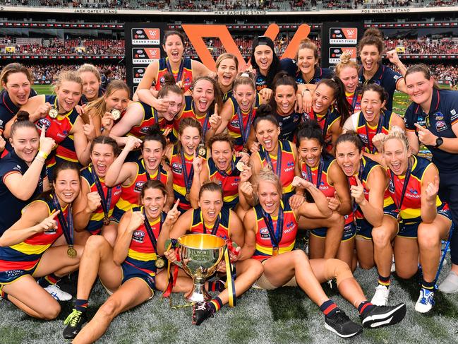 Jess Foley - centre, back row - celebrates with her Crows teammates after their premiership win over Carlton in 2019. Picture: Daniel Kalisz/Getty Images