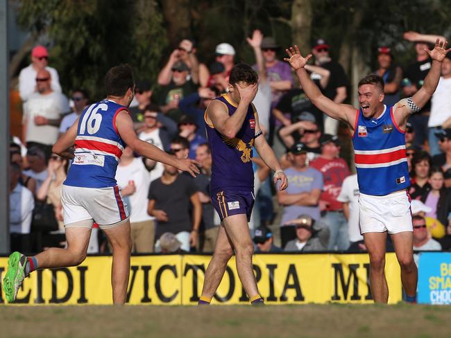 Jake Tucker and James Crowle celebrate last year’s grand final fairytale. Picture: Hamish Blair