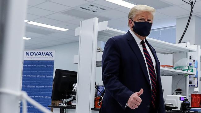 Donald Trump tours a biotech company in North Carolina. Picture: Reuters