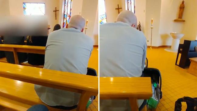 A fellow church-goer has captured the moment a Dad used his baby's capsule to sneakily watch soccer while at church.