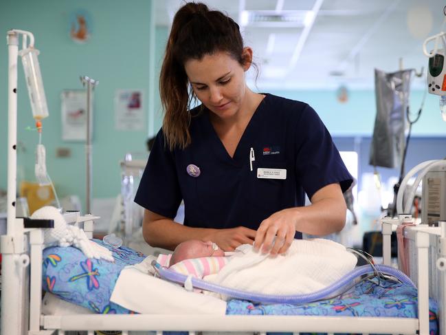 Nurse Rebecca checking on Skylah. Picture: Sam Ruttyn