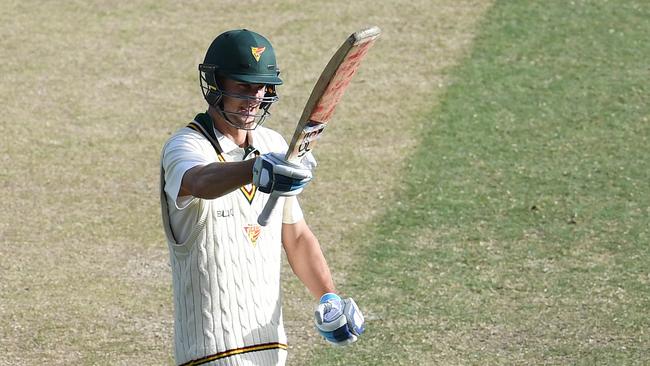 Beau Webster celebrates a century for Tasmania against New South Wales.