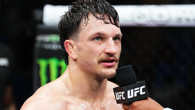 PERTH, AUSTRALIA - AUGUST 18: Jack Jenkins of Australia reacts after a TKO victory against Herbert Burns of Brazil in a featherweight fight during the UFC 305 event at RAC Arena on August 18, 2024 in Perth, Australia. (Photo by Jeff Bottari/Zuffa LLC)