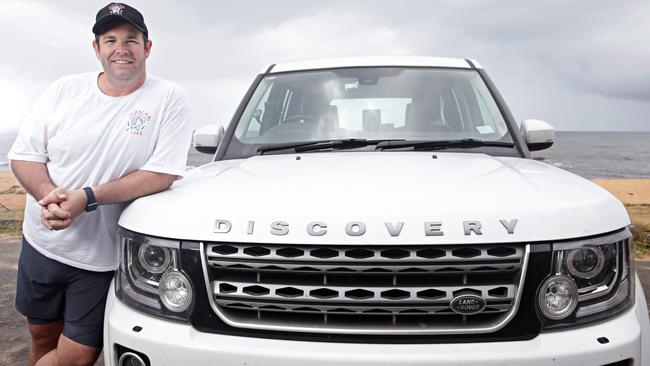 DJ and TV star Gus Worland with his Land Rover. Picture: Adam Yip / Manly Daily