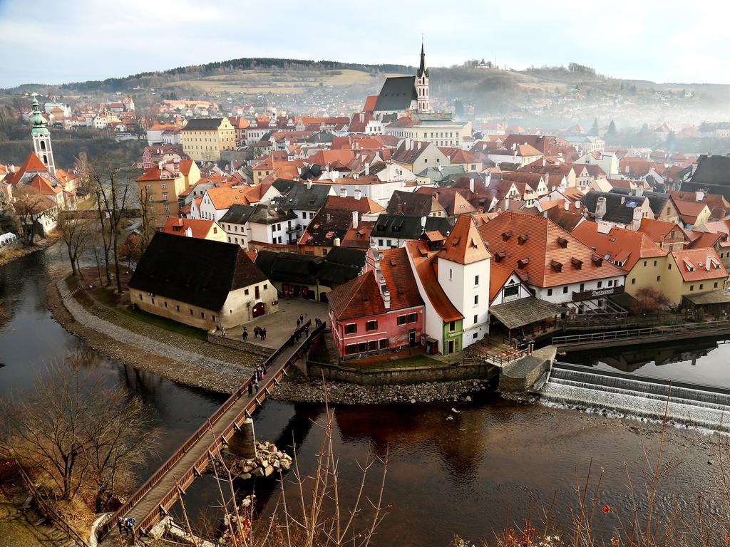 “Foggy Small Town” by Duowen Chen / National Geographic Traveler Photo Contest This photo was captured at noon, 25.12.2013, from the castle which is located on the edge of the small town and is the perfect viewpoint for the panorama of the almost intact historical town. The fog and mist suffused and gave the town a sense of mystery. Location: Český Krumlov, South Bohemian, Czech Republic. Picture: <a href="http://travel.nationalgeographic.com/travel/traveler-magazine/photo-contest/2014" target="_blank">National Geographic Photo Contest </a>