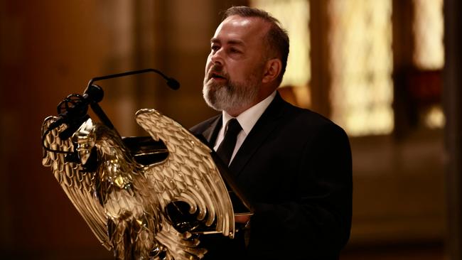 Her husband Andrew Landeryou addresses the memorial congregation at St Patrick’s Cathedral. Picture: David Geraghty