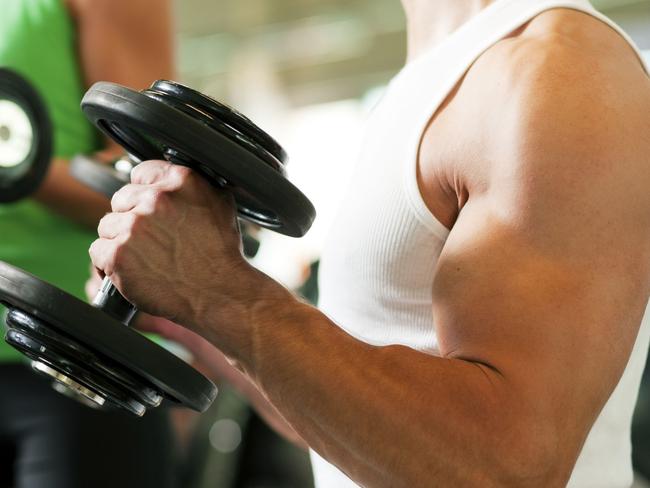 Dumbbell training in gym