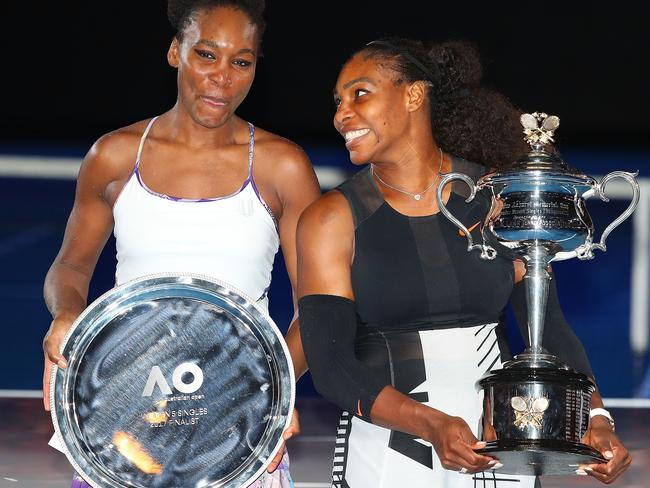 Serena Williams poses with sister Venus Williams after the Australian Open.  Picture:  Getty