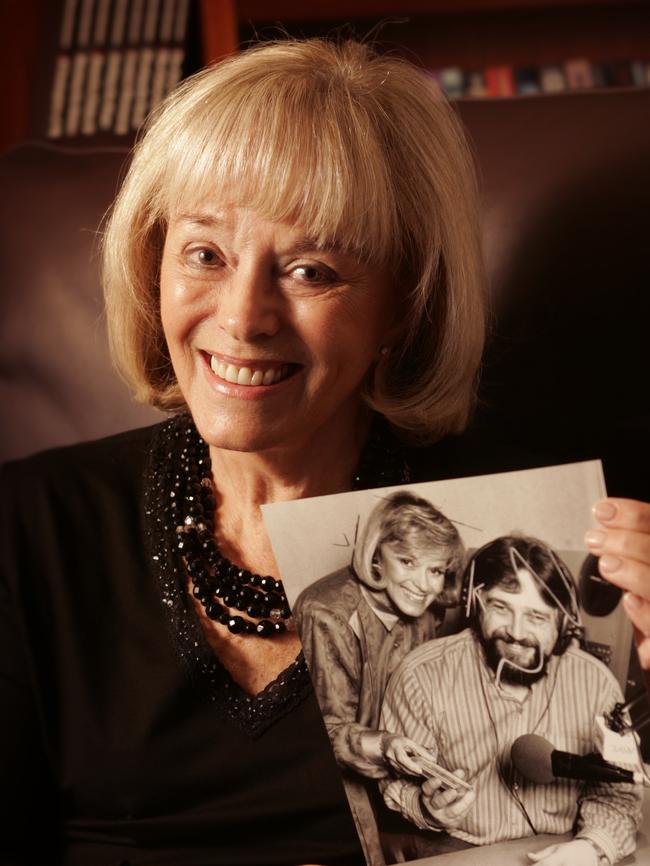 Rosemary Margan with a 17 year old photo of herself and Neil Mitchell