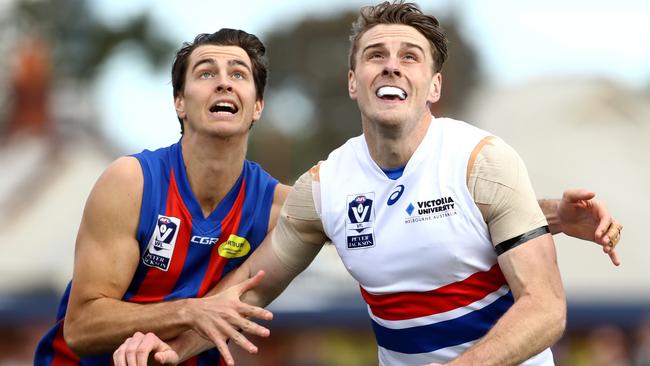 Jordan Roughead (right) competes for a throw-in during his VFL comeback game. Picture: Mark Dadswell