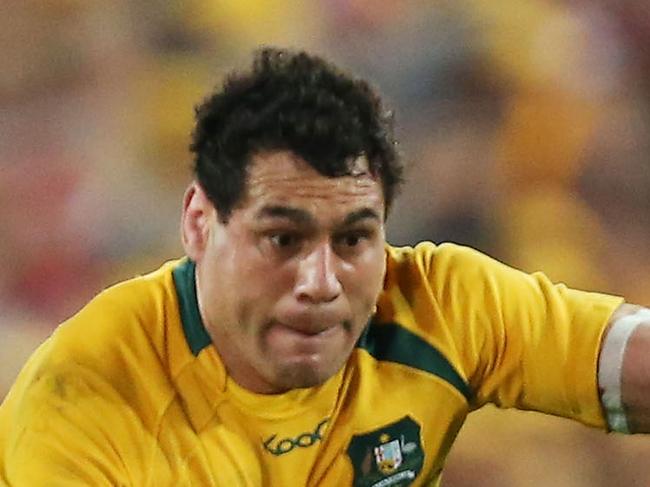 SYDNEY, AUSTRALIA - JULY 06: George Smith of the Wallabies takes on the defence during the International Test match between the Australian Wallabies and British & Irish Lions at ANZ Stadium on July 6, 2013 in Sydney, Australia. (Photo by Matt King/Getty Images)