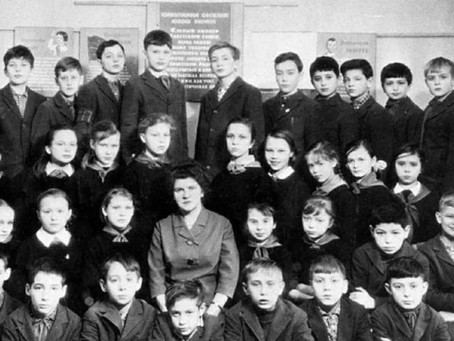 Vladimir Putin pictured in a school photo (bottom row, 3rd right). Picture: Zumapress.com/Australscope