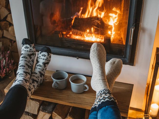 Lazy winer day in front of fire in fireplace.