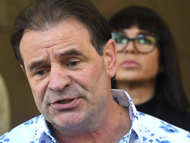 CFMEU boss John Setka (left) and wife Emma Walters speak to the media outside the Melbourne Magistrates Court. Picture: Julian Smith/AAP