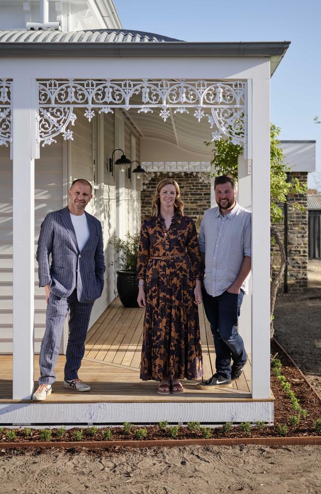 Anthony Burke with Bree and Luke of Belmont in front of their home which was transformed in season one of Grand Designs Transformations.