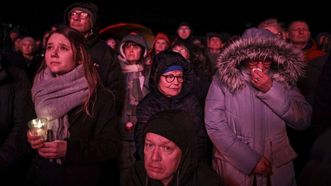 People gather outside the Magdeburg Dom church. Picture: Omer Messinger/Getty