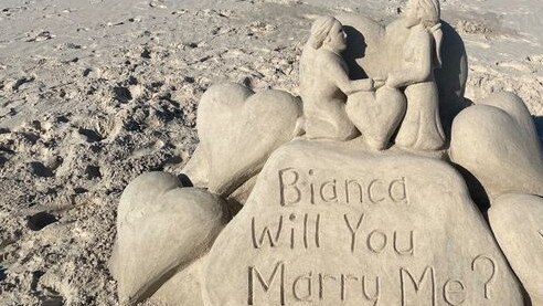 ROMANTIC: Someone has created a romantic proposal at Belongil Beach.