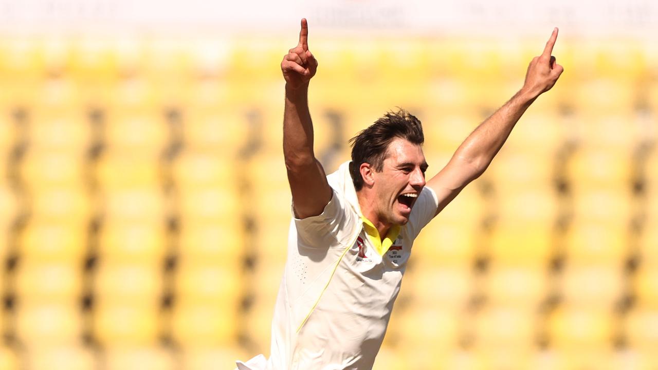 Skipper Pat Cummins was leaking runs, until he finally claimed the wicket of Rohit Sharma. Picture: Getty Images.