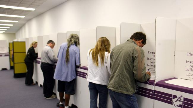 Federal Election 2007, Australian Electoral Commission (AEC) offices AMP Building Hobart, early voters casting their votes