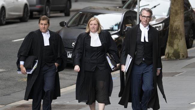 Channel 9 lawyers who quizzed Person 5 today arrive at the Supreme Court. Pic: Simon Bullard