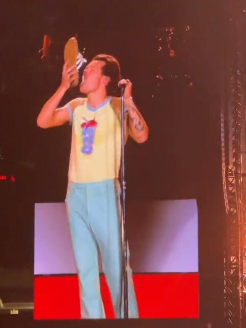 Styles does a Shoey at his concert in Perth. Picture: Twitter