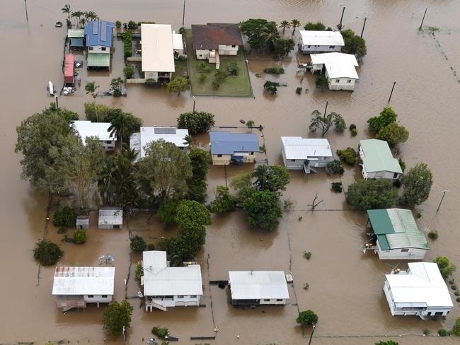 Houses are inundated with flood waters in Ingham in North Queensland. (AAP Image/Dan Peled)