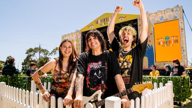 Band manager Rachel Whitford and musicians Aston Valladares and Dan Steinert from Towns inside of a socially distanced pod at the Summer Sounds festival at Bonython Park. Picture: Morgan Sette