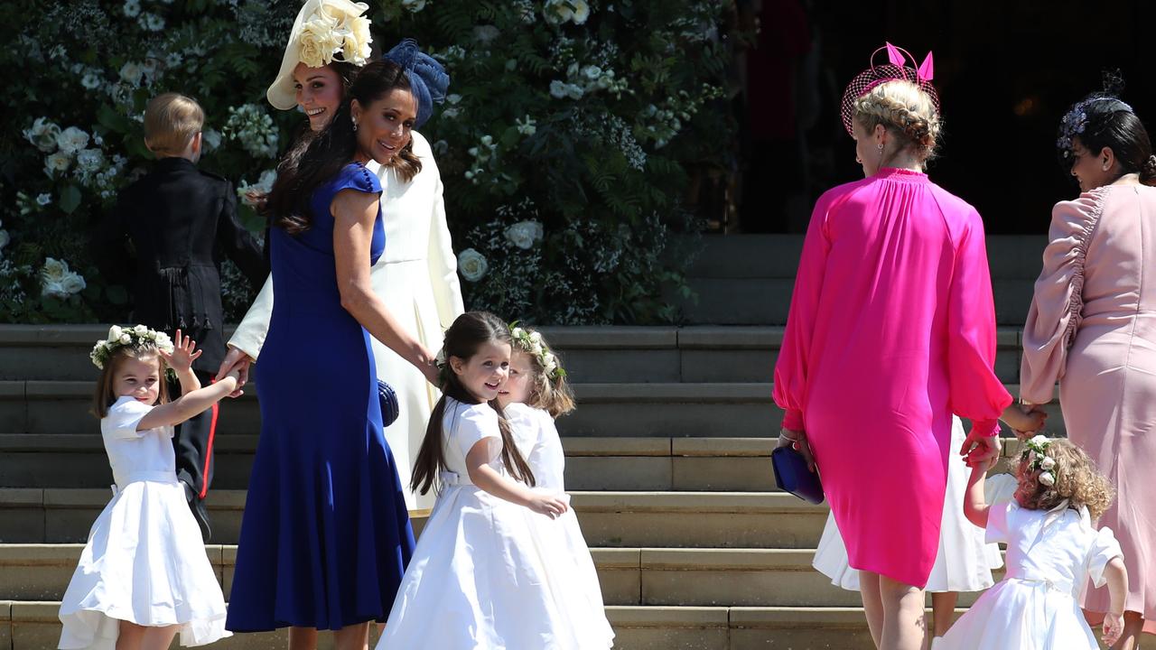 Jessica Mulroney with the Duchess of Cambridge, Princess Charlotte and Ivy Mulroney at Meghan’s wedding. Picture: Jane Barlow – WPA Pool/Getty Images