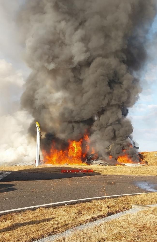 The aircraft burst into flames after a crash landing. Picture: South Korean National Fire Agency via Getty Images