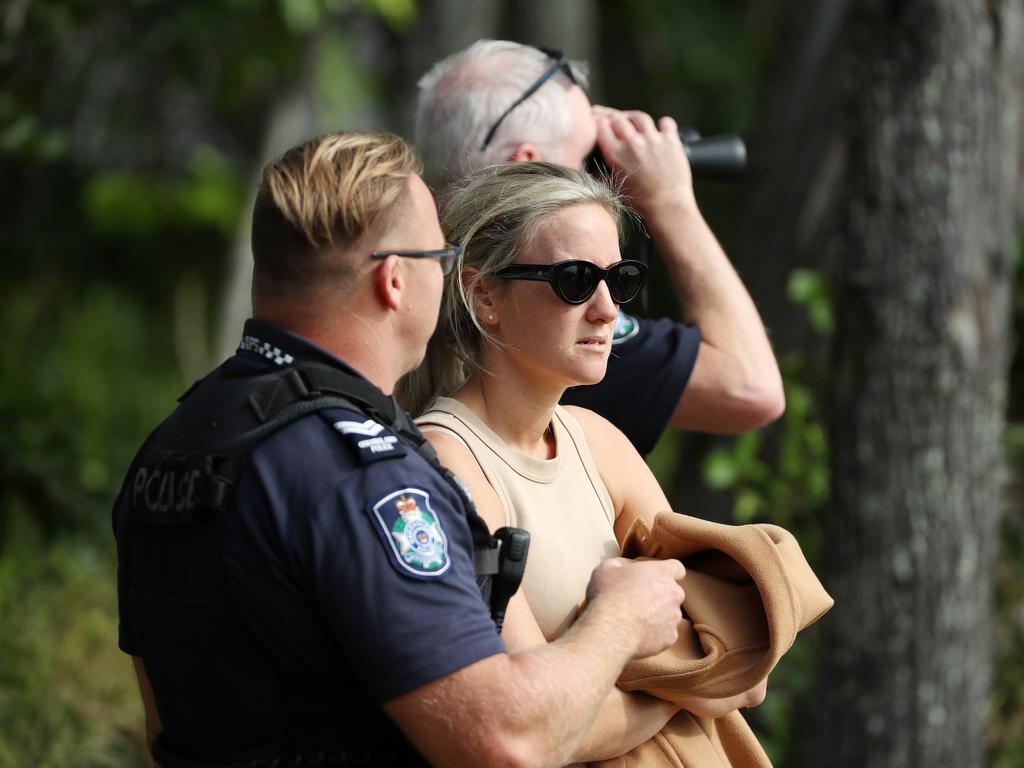 Police talking to missing man Jordan Kelly's sister Danielle Brittain, during the search off North Stradbroke Island. Picture: Liam Kidston