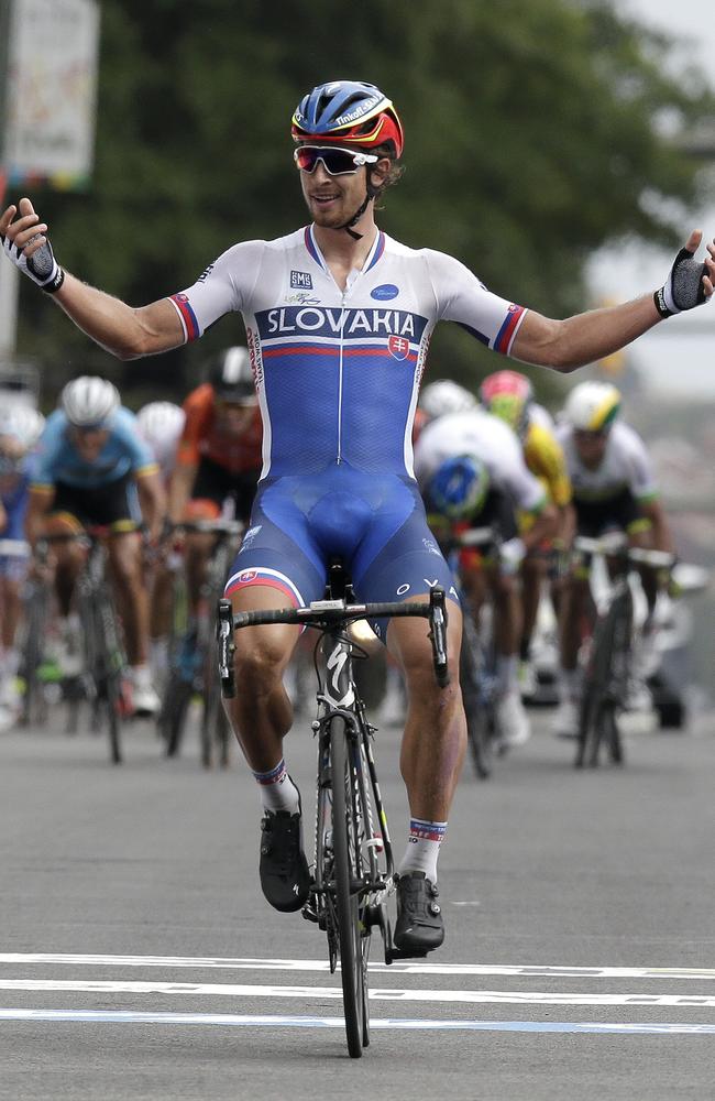 Peter Sagan, of Slovakia, reacts as he crosses the finish line to win the men's elite road circuit race in the UCI Road World Championships in Richmond.