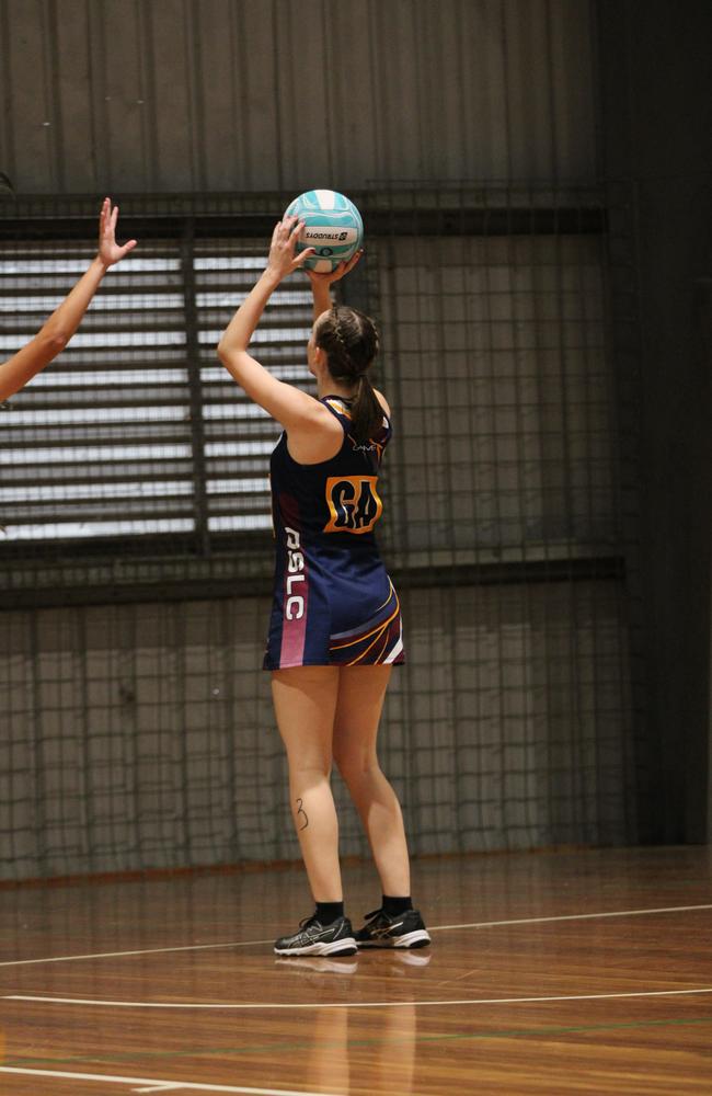 Netball action at QISSN 2024. Canterbury College v Good Shepherd Lutheran College