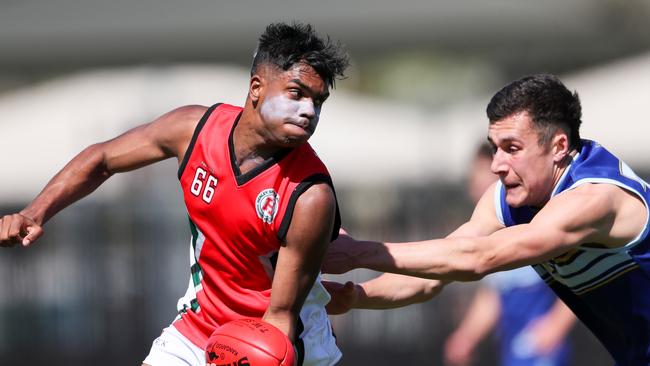 Henley talent and Crows NGA product Bucky Newchurch evades Sacred Heart’s Jarrad Parish during the All Schools Cup clash at Thebarton Oval. Picture Matt Turner.