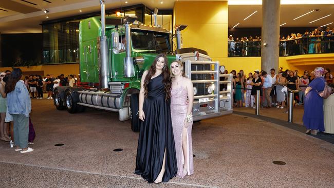 Natalie Raciti and Indyah Willoughby-Dwyer arrive in a big rig to the Trinity Bay High School formal evening, held at the Cairns Convention Centre. Picture: Brendan Radke