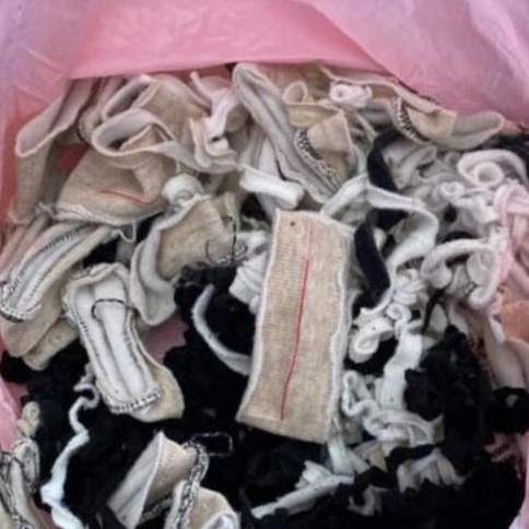 An unsolicited parcel filled with junk rags sent to a private address. Picture: Supplied