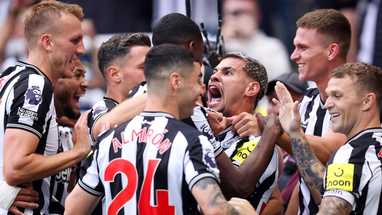 NEWCASTLE UPON TYNE, ENGLAND - AUGUST 12: Sandro Tonali of Newcastle United (hidden) celebrates with teammates after scoring the team's first goal during the Premier League match between Newcastle United and Aston Villa at St. James Park on August 12, 2023 in Newcastle upon Tyne, England. (Photo by George Wood/Getty Images)