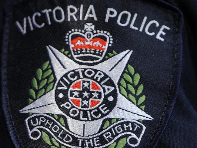 Victoria Police logo as seen at the Victoria Police Centre in Melbourne, Tuesday, Oct. 8, 2013. Victoria Police have announced they are investigating up to three members over possesion of performance enhancing drugs. (AAP Image/Julian Smith) NO ARCHIVING