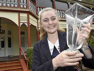 TOP TEAM: The Glennie School equestrian team captain Sarah-Jane Coggan celebrates the school being named Equestrian Queensland School of the Year. Picture: Bev Lacey