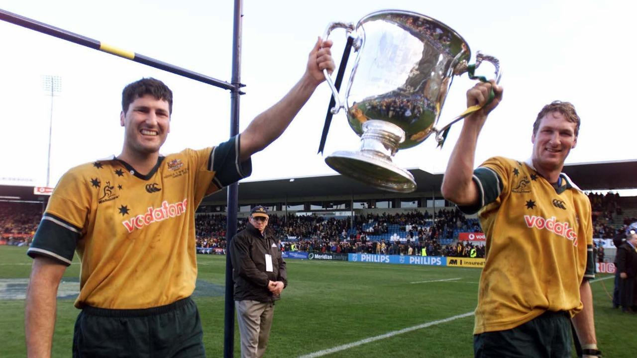 Wallabies captain John Eales and Justin Harrison with the Bledisloe Cup in Dunedin.