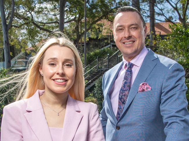 30-07-2021 CAREERS COVER Real estate agent Jason Adcock and his latest hire, Charlotte Agace, who got the job because she bothered to pick up the phone. Pictured at a property they have just sold in Graceville, Brisbane. PICTURE: Brad Fleet