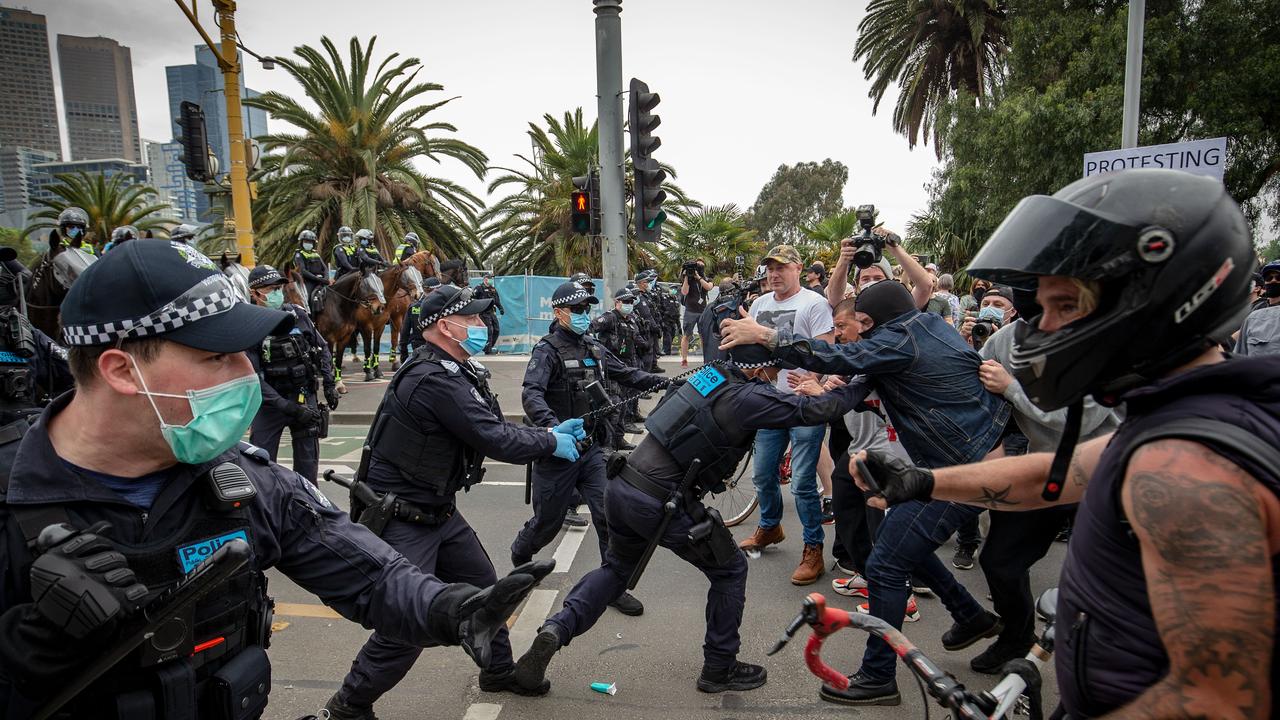 Tensions are rising in Melbourne over the city’s months of lockdown, as protesters clashed with police on Friday. Photo: Darrian Traynor/Getty Images