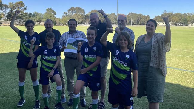 Barossa United president George Triandafyllidis, secretary Lisa Ognjanovic and players with Federal MP Tony Pasin and Barossa Mayor Bim Lange. Picture: Jason Katsaras