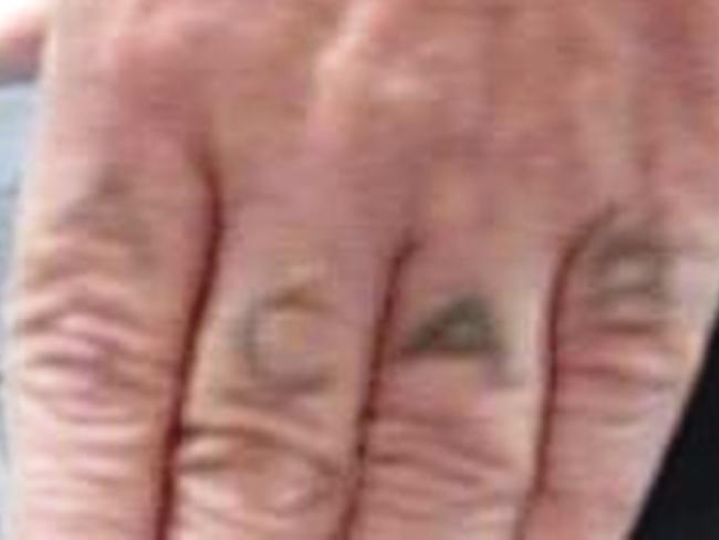 The ACAB (All Cops Are Bastards) tattoo on the hand of Jimmy Kinch. Picture: Supplied